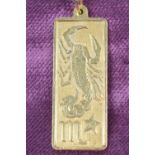 An 18ct gold zodiac pendant The rectangular shape pendant depicting Scorpio, import marks for