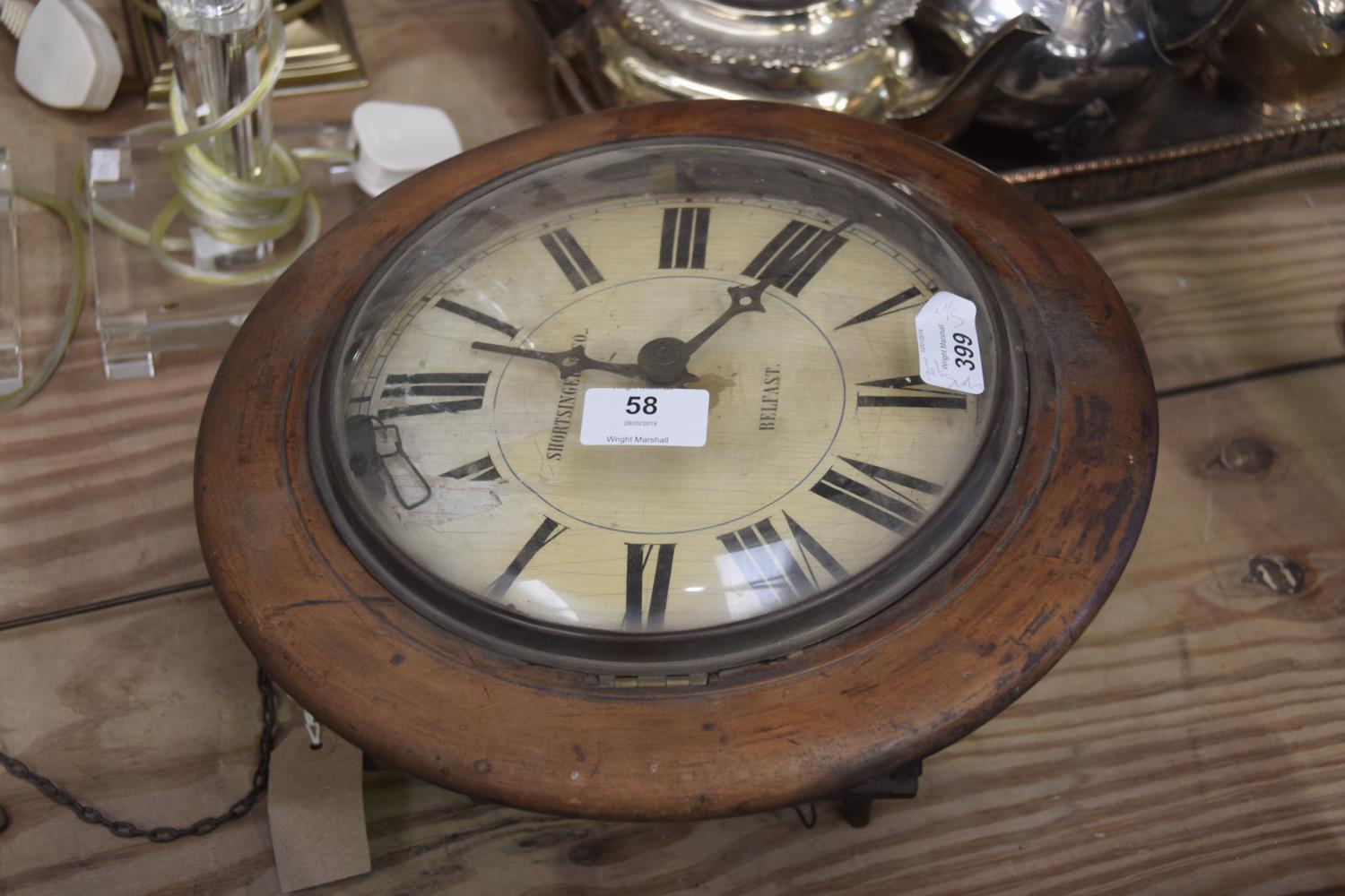 A Shortsinger & Co., Belfast, Ireland wall clock, 19th Century Having a 23cm dial painted with Roman