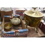 A lidded brass coal bucket on paw feet, brass saucepan, beer pump handles, qty.