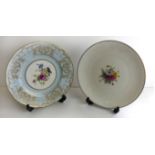 Two Royal Worcester hand painted cabinet plates Of circular form, each having floral decoration, one