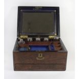 A Victorian burr walnut vanity box The hinged cover lifts to enclose mirror and detachable drawer