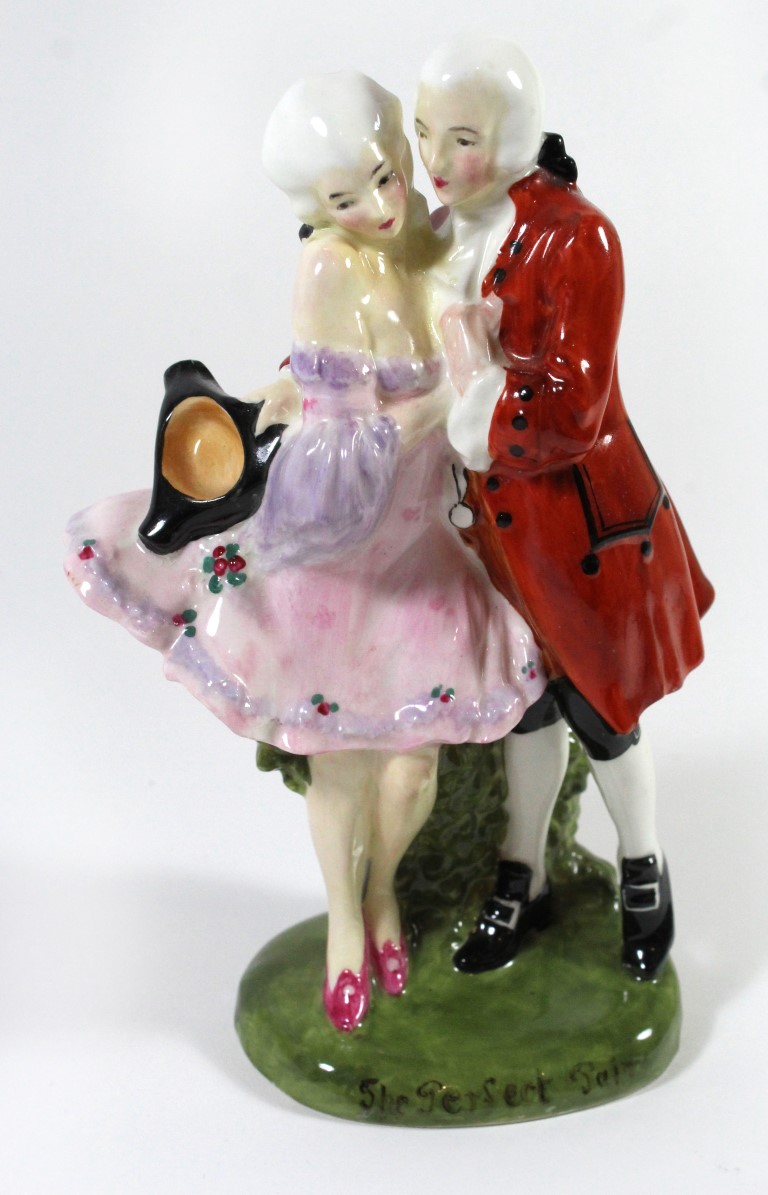 A Royal Doulton figure group 'The Perfect Pair' Green transfer mark to base, height 19cm