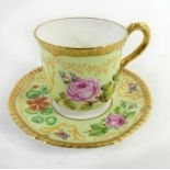 A Royal Worcester cabinet cup and saucer Decorated with Samuel Astles, English Flowers pattern,