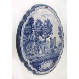 A large 19th Century blue and white Delft wall plaque Decorated with a classical scene with