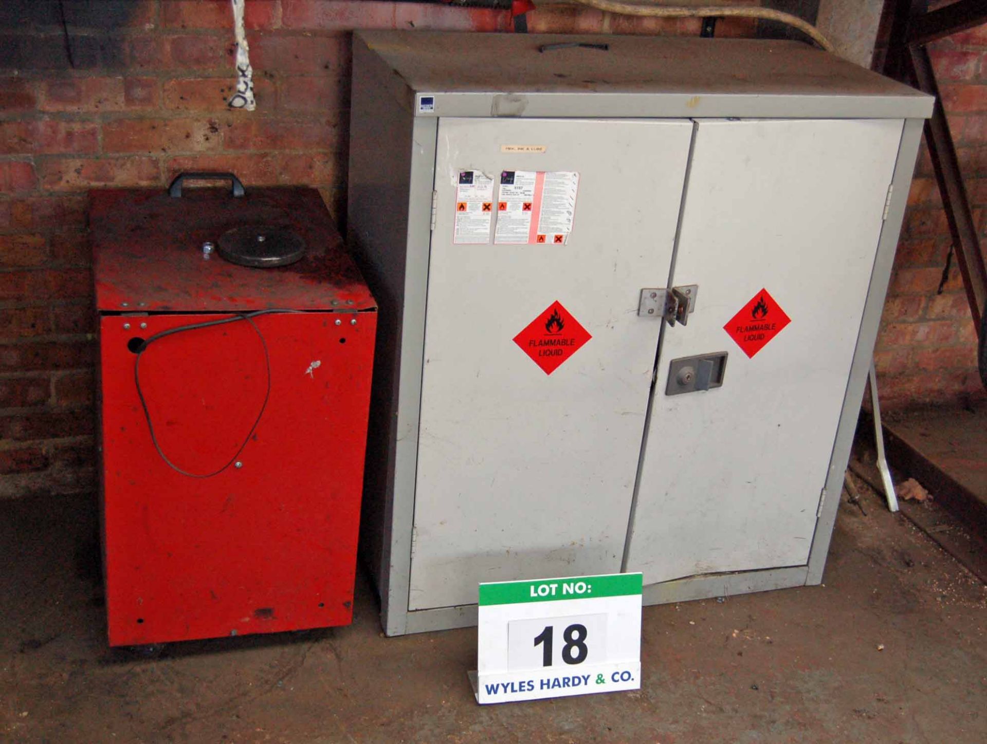 A Grey Steel 2-Door Flammables Cabinet and A Red Steel Cabinet