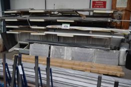 An Adjustable Steel Stock Rack with Contents including Waste Pipe, Finishing Strips, Gaskets,