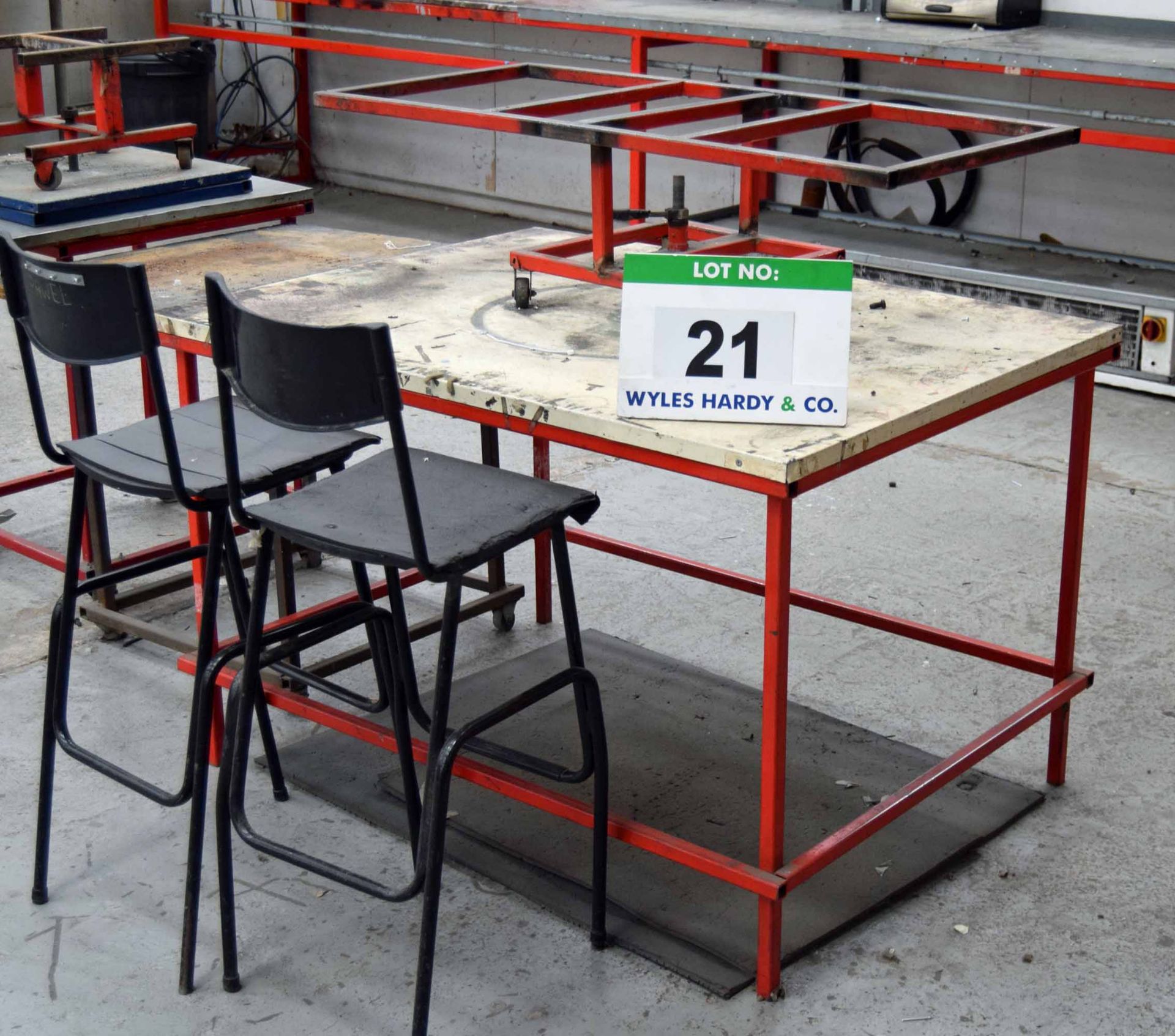 A Welded Steel Assembly Table with Rotating Workpiece Jig, Two Stools and Side Table (As