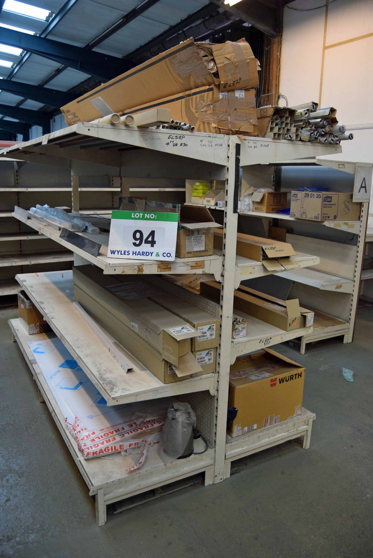 The Contents of the Gondola Shelving including LED/Fluorescent Lighting and Chiller Dividers (As