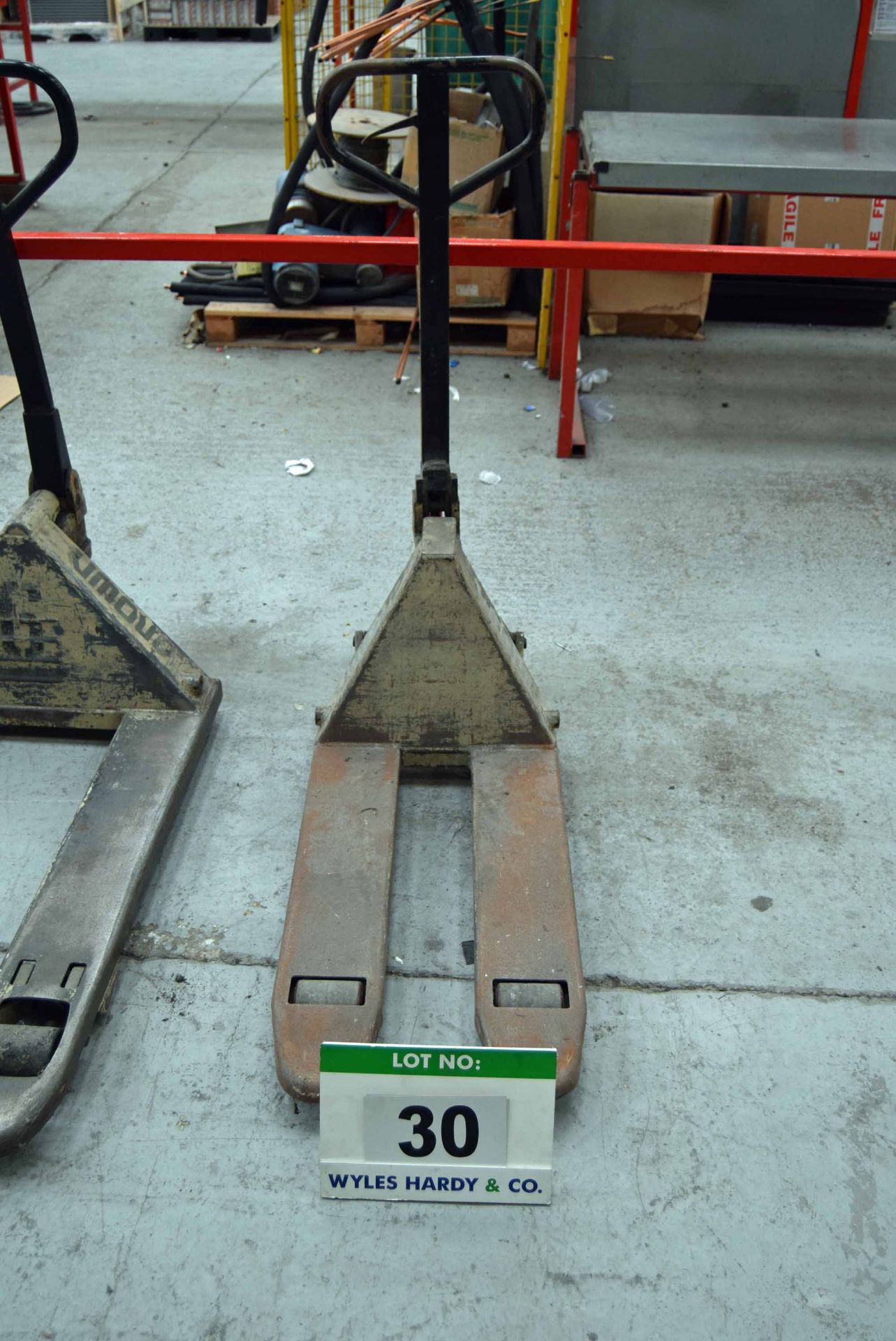 A CROWN Compact Hydraulic Pallet Truck