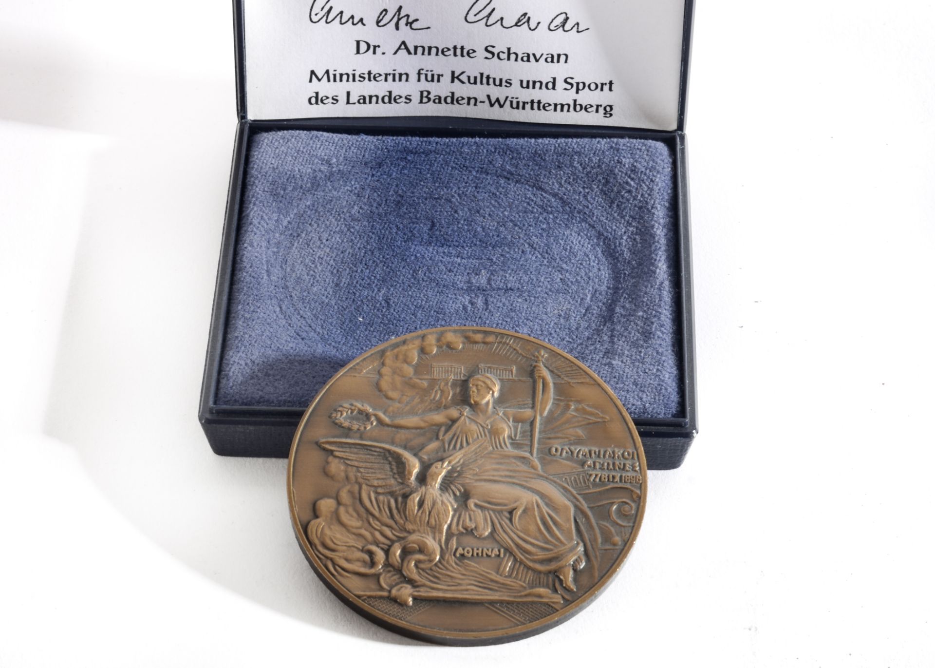 A 100 Year Commemorative Cast Metal Medal bearing a Relief of AOHNAI and the words OΛYPIAKOI ARΩ - Image 2 of 3