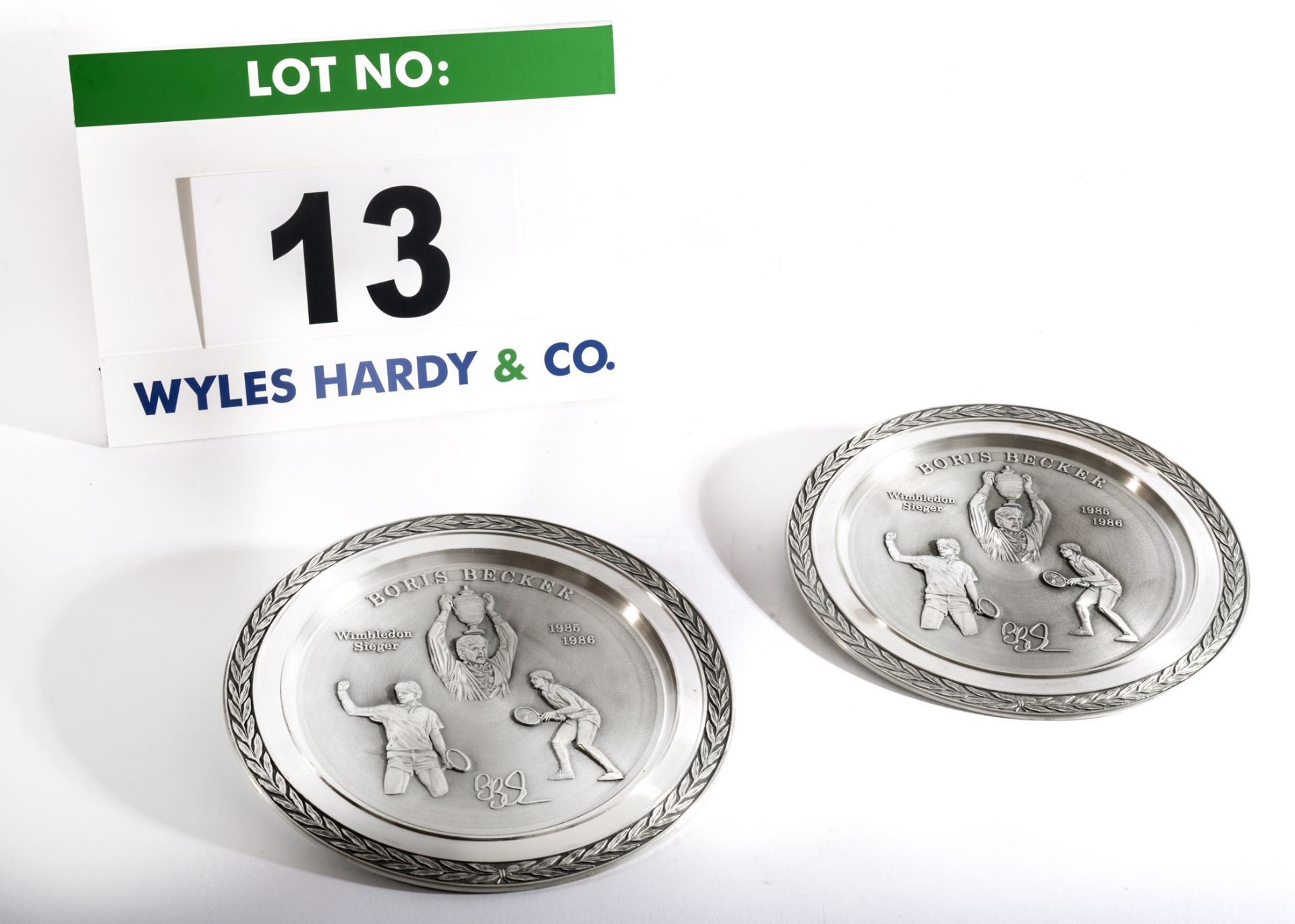 Two Cast Pewter approx. 240mm diameter Commemorative Plates with Laurel Leaf Relief Borders and