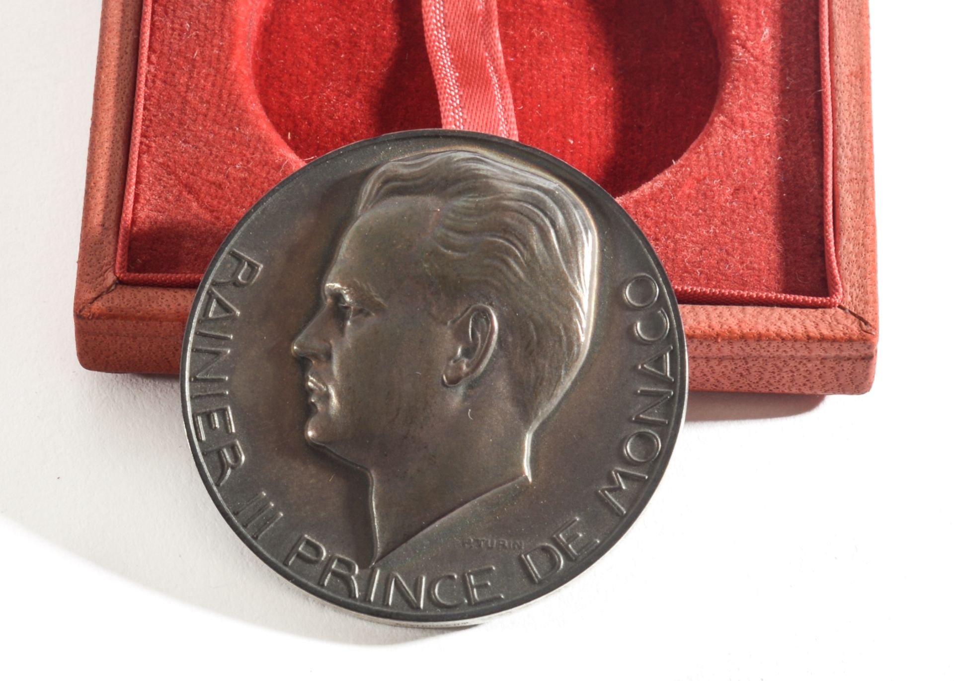A Cast Medal, 40mm in diameter, bearing a Relief of Rainier III Prince De Monaco and his Head on