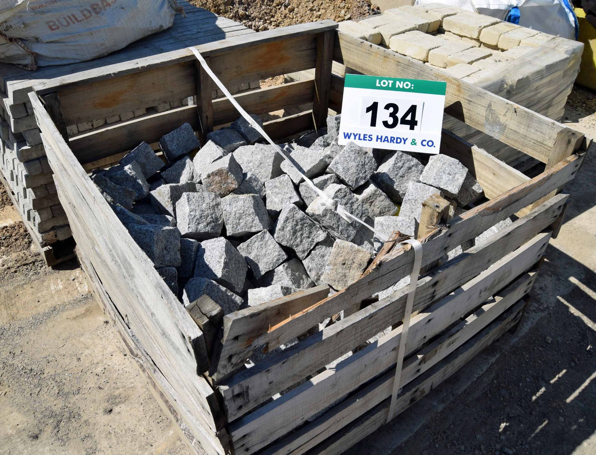 A Wooden Stillage containing A Quantity of Granite Sets