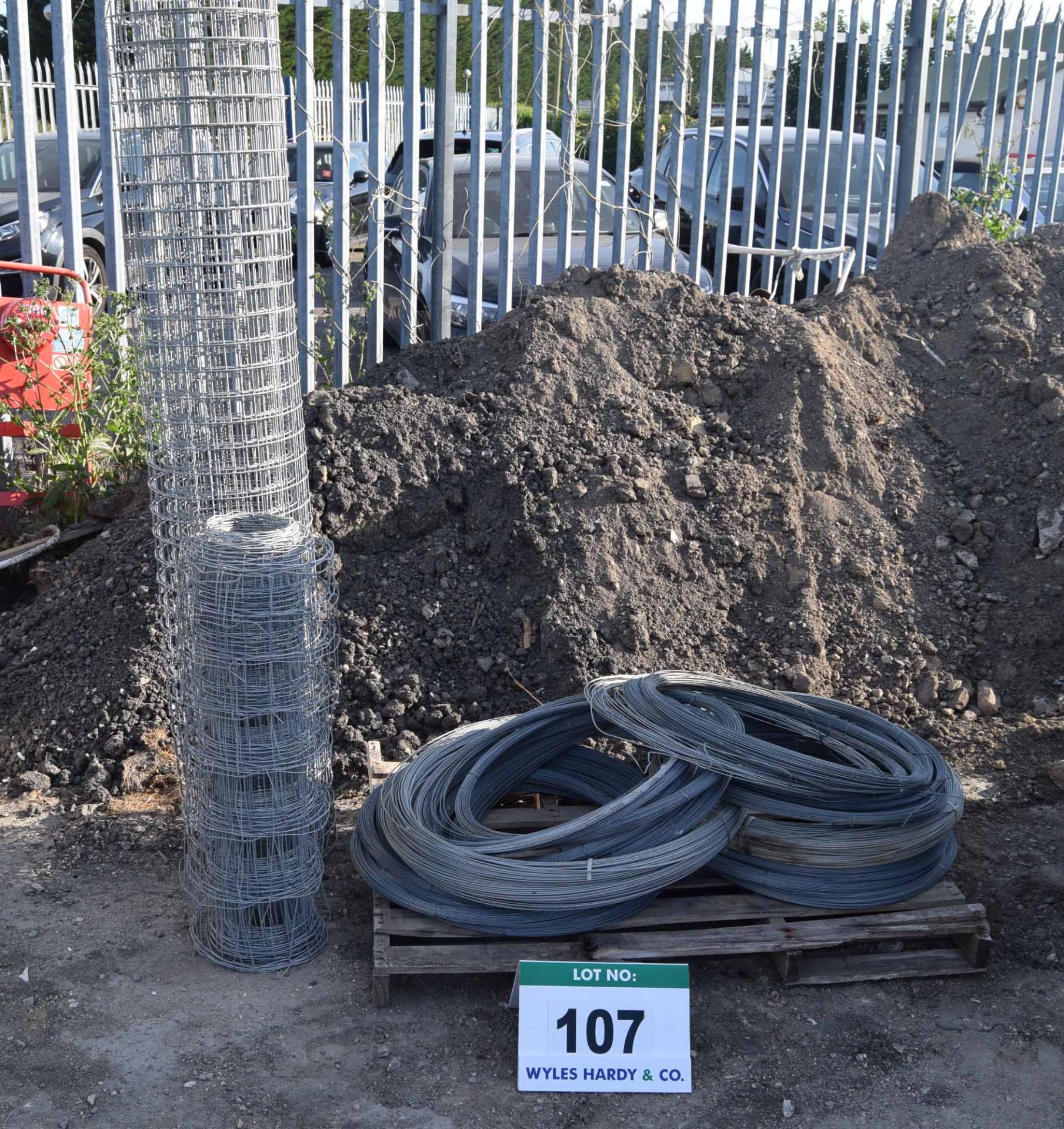 Twenty One Spools of 2mm Steel Fencing Wire with Two Coils of Fencing Mesh