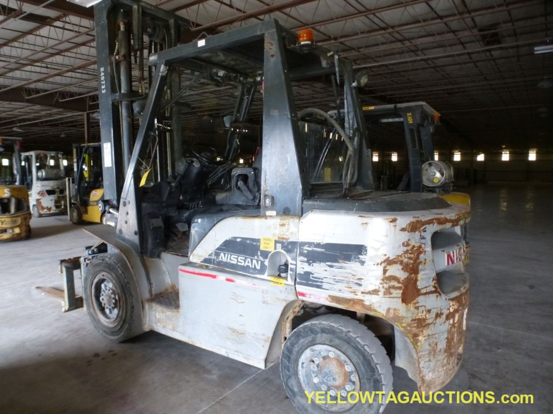 Nissan Diesel Forklift - Model No. MW1F4A40V; 48" Forks; 8981 Hours; Max Capacity: 8600 lbs; Max - Image 2 of 25