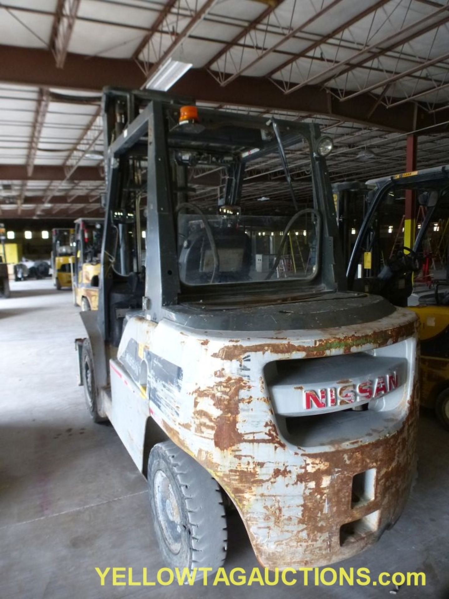 Nissan Diesel Forklift - Model No. MW1F4A40V; 48" Forks; 8981 Hours; Max Capacity: 8600 lbs; Max - Image 15 of 25