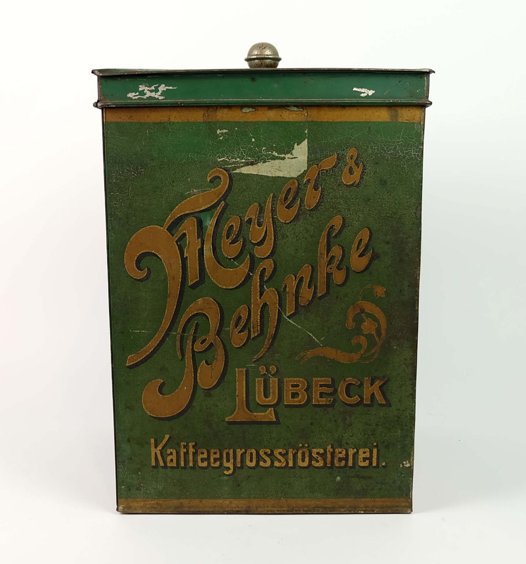 GROßE KAFFEEDOSE, 1910er Jahre, grünes Blech, in den Seiten beschriftet: Meyer & Behnke/ Lübeck