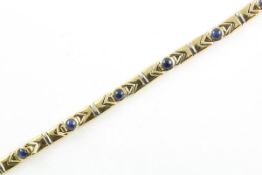 ARMBAND, 585/ooo Gelbgold, besetzt mit sechs runden Safircabochons von zusammen ca. 2,4 ct., L 18,