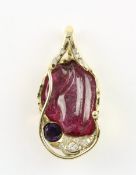 ANHÄNGER, 585/ooo Gelbgold, geschnitzter, pinker Turmalin von ca. 39,3 ct. sowie ein Amethyst von