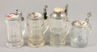 VIER GLASHUMPEN, farbloses Glas, Zinnmontur, drei Exemplare mit Porzellandeckel, polychrom