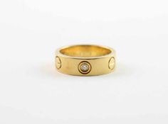 CARTIER-RING LOVE, 750/ooo Gelbgold, besetzt mit Brillanten von zusammen ca. 0,15 ct., Referenznr.