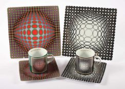 ZWEI KAFFEEGEDECKE, polychrom dekoriert mit Motiven nach Victor Vasarely, Tasse H 7,5, limitierte