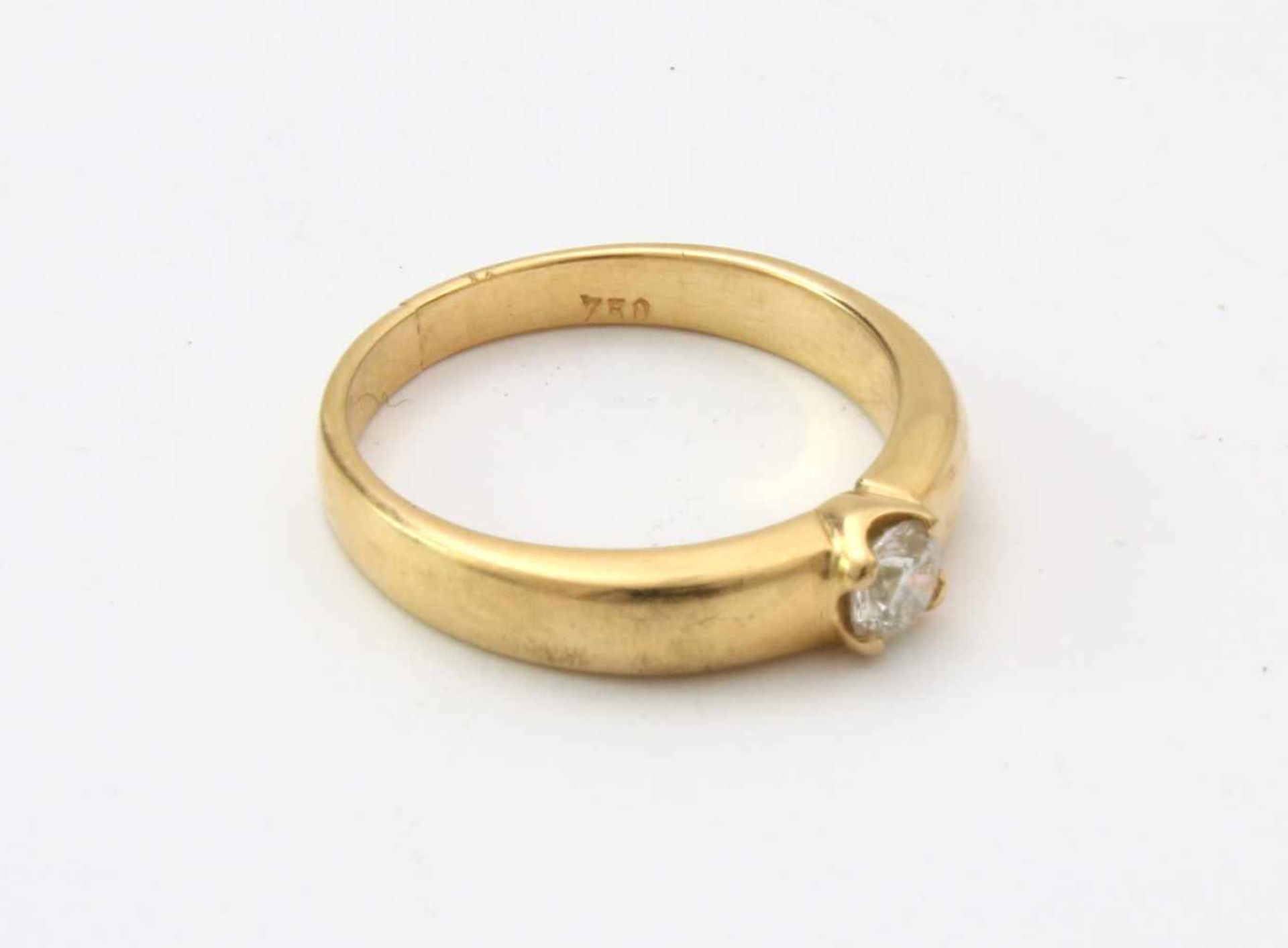 Gelbgold-Ring mit Brillant SolitärGG 750, Brillant Ø ca. 4mm - errechnet 0,23 ct., gute Qualität,