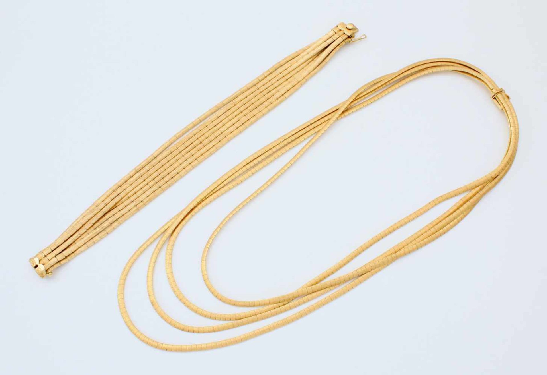 Gelbgold-Collier und passendes ArmbandGG 750, Collier aus 4 flexiblen Plattenbändern, Oberfläche