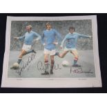 Signed Manchester City legends print. with the signatures of Colin Bell, Franny Lee, and Mike