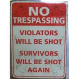 Enameled metal backed sign "NO TRESSPASSING" 70 x 50cm