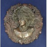 Stunning late Victorian cast bronze of a lady presented on a heavily carved mahogany circular panel,