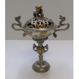 Chinese white metal ornate lidded censor with dragon handles and foo dog atop the seperate lid 22 cm