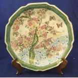 20thC Chinese plate with polychrome decoration depicting cherry blossom & ducks, with wooden