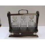 3 bottle antique, early 20thC tantalus complete with key 36 cm in length The bottles all have