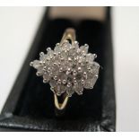 9ct yellow gold diamond cluster ring (0.29ct) Approx 1.7 grams gross, size M