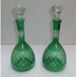 Pair of superb Victorian cut-glass green decanters Both decanters measure 37 cm high Both in good