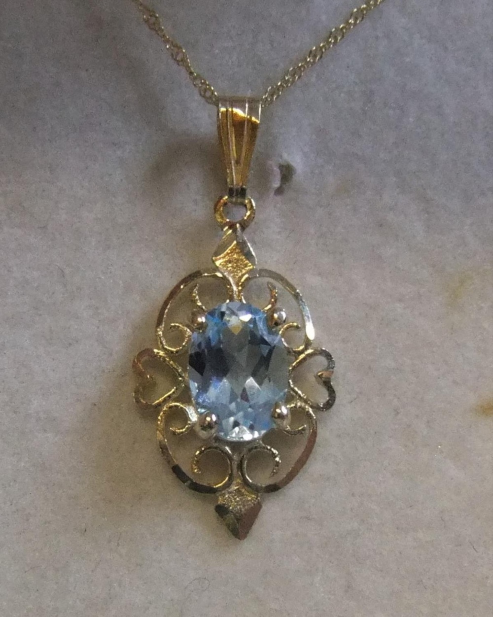 9ct yellow gold chain together with 9ct gold pendant with solitaire topaz Approx gross weight 1 - Image 2 of 3