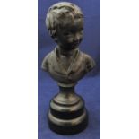 Bronze bust of a young boy on a circular plinth 26cm high