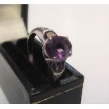 9ct white gold, 3 stone amethyst ring with diamonds to both shoulders Approx 3.7 grams gross, size N