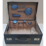 Early 20thC, ladies vanity case with blue enamelled accessories etc the case measures 46 x 33 x 19