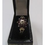 9ct yellow gold ruby & diamond flower ring Approx 1.6 grams gross, size L