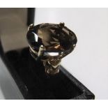 9ct yellow gold ring with large oval cut quartz Approx 3.6 grams gross, size M
