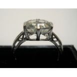 9ct white gold ring with large clear stone & 3 small diamonds to each shoulder Approx 2.7 grams