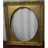 Superb, large Victorian gilt gesso frame with feigned oval Internal measurements - 96 x 75cm (the