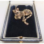 Stunning modernist 9ct gold brooch of a leopard studied with sapphires, diamonds and rubies Approx