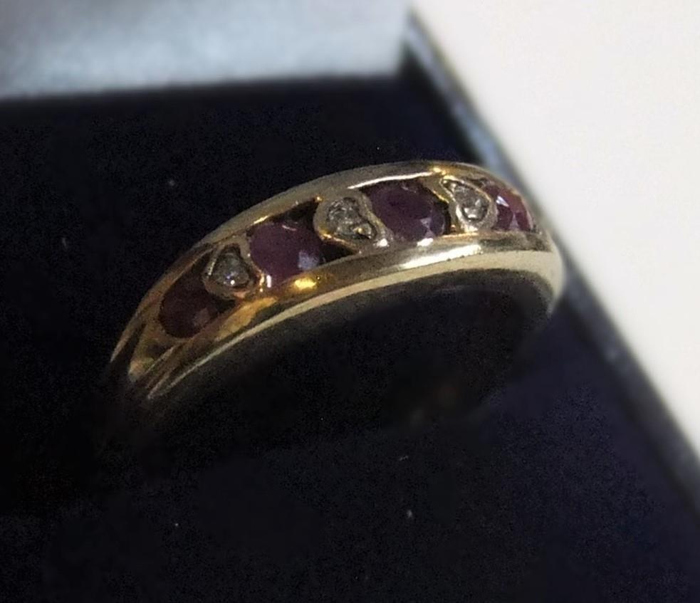 9ct yellow gold ring with round cut rubies interspersed with diamonds approx 2.3 grams gross, size N - Image 2 of 3