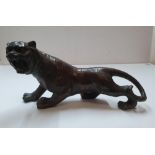 Antique unmarked Chinese bronze tiger, 30 cm in length