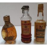 3 vintage miniature bottles of alcohol including Booths dry gin, Gordons orange bitters and Dimple