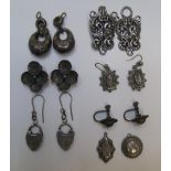 Collection of antique silver & white metal earrings & pendants and 1 Norway pewter belt buckle