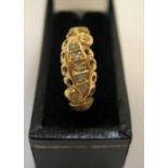 18ct yellow gold, boat shaped ring with 5 square cut diamonds Approx 1.9 grams gross, size J/K